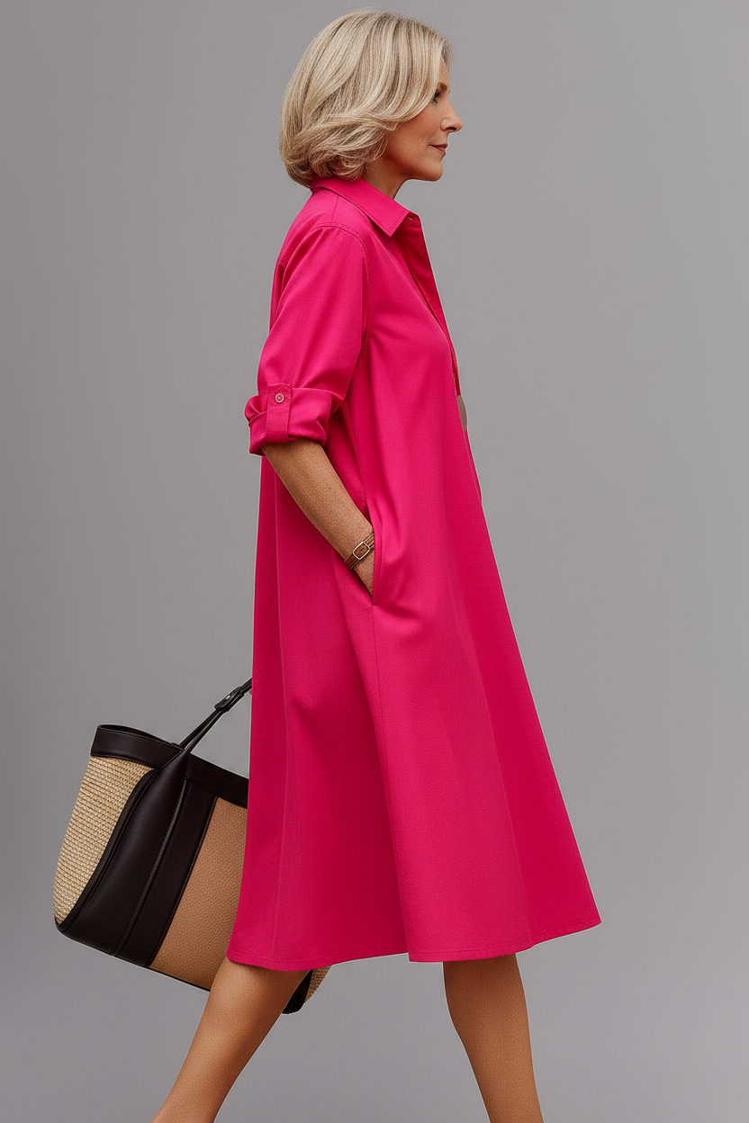 Vestido midi rosa - pose lateral caminando
