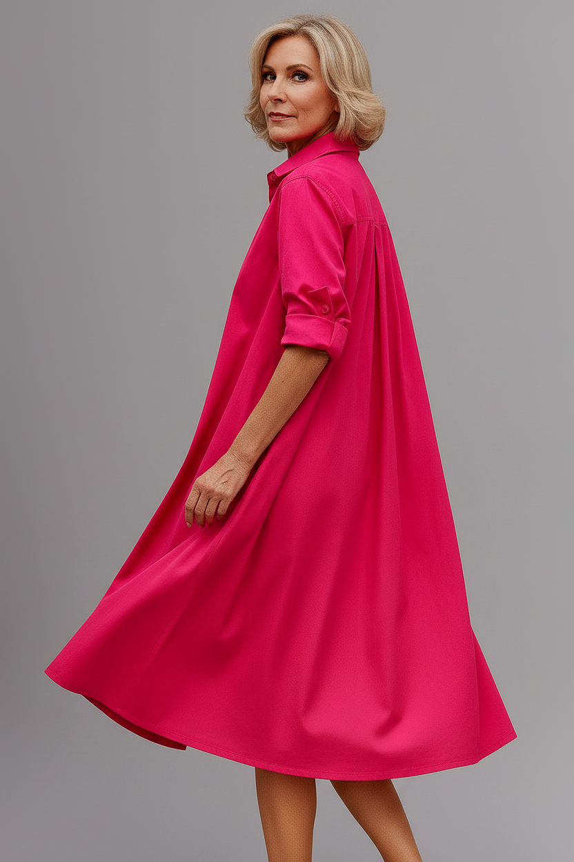 Vestido midi rosa - de espaldas mirando al hombro