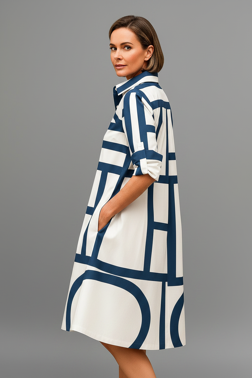 Vestido midi blanco azul - de espaldas mirando al hombro