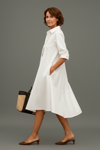 Vestido midi blanco - pose lateral caminando