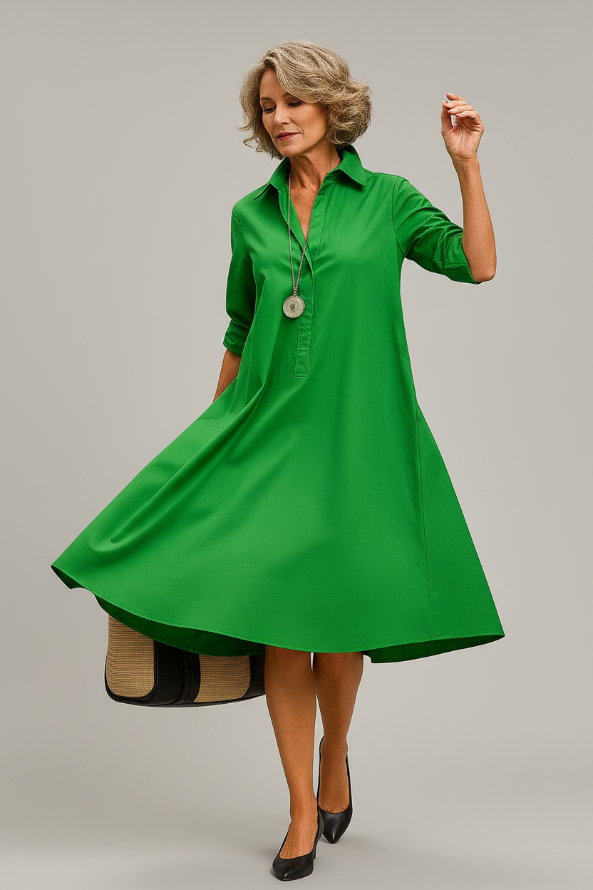 Vestido midi verde - brazos elevados fluyendo