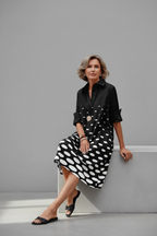 Vestido midi negro - sentada con elegancia