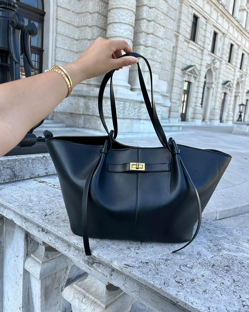 Bolso Curva Icon