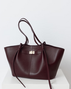 Bolso Curva Icon